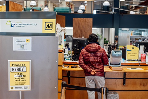 AA - With someone waiting at the desk.
