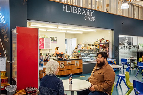 The Library Café - two people enjoying a coffee. 
