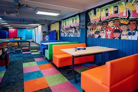 The Youth Space - Boot tables and colourfull carpet.