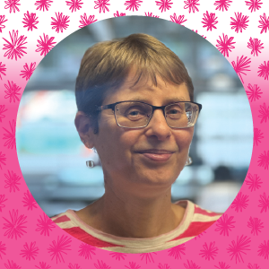 Larissa staff image pink flower background.