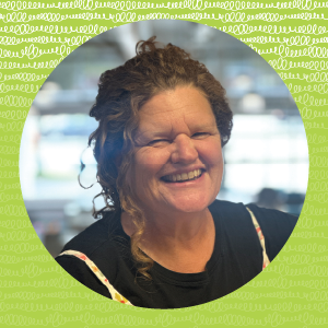 Sarah staff image green wavy background.